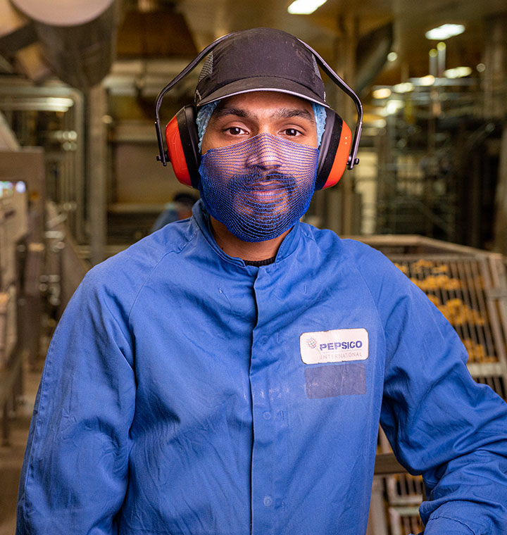 PepsiCo employee in a manufacturing site